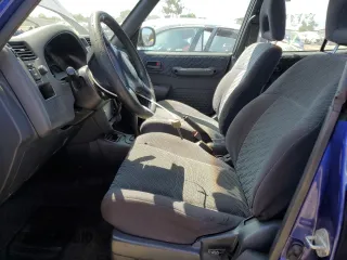 1999 Toyota RAV4 with VIN JT3GP10V8X0036366, listed as a Copart auction lot 61864455 with 229,711 mi miles and Salvage title. Bid and sale history available at DreamBid. Image 7.
