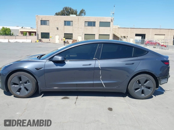 2023 Tesla Model 3 with VIN 5YJ3E1EAXPF405588, listed as a IAAI auction lot 42348952 with 30,788 mi miles and . Bid and sale history available at DreamBid. Image 15.