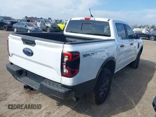 2024 Ford Ranger XLT with VIN 1FTER4GH1RLE26029, listed as a IAAI auction lot 41958379 with 9,716 mi miles and . Bid and sale history available at DreamBid. Image 4.