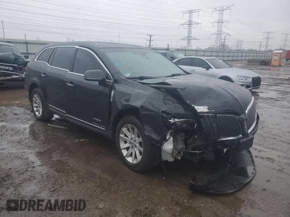 2015 Lincoln MKT with VIN 2LMHJ5NK1FBL04078, listed as a Copart auction lot 86774444 with 547,015 mi miles and Salvage Title. Bid and sale history available at DreamBid. Image 4.