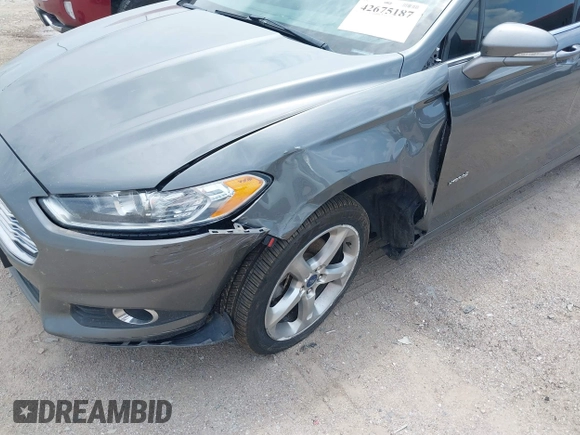 2013 Ford Fusion SE Hybrid с VIN 3FA6P0LU1DR267258, выставлен на аукционе IAAI как лот 42675187 с пробегом 184 121 миль миль и . История ставок и продаж доступна на DreamBid. Изображение 6.