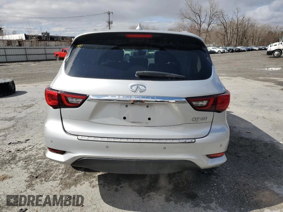 2018 Infiniti QX60 with VIN 5N1DL0MMXJC520725, listed as a Copart auction lot 52320875 with 76,056 mi miles and Salvage Title. Bid and sale history available at DreamBid. Image 6.