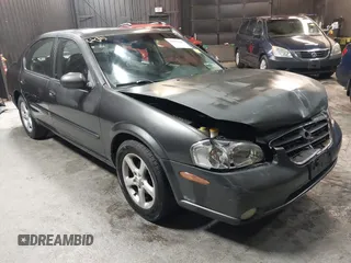 2001 Nissan Maxima SE with VIN JN1CA31A91T112866, listed as a IAAI auction lot 42372546 with 156,069 mi miles and . Bid and sale history available at DreamBid. Image 1.