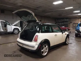 2004 MINI Hardtop with VIN WMWRC33404TC48963, listed as a IAAI auction lot 41661909 with 182,532 mi miles and . Bid and sale history available at DreamBid. Image 4.