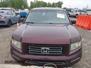 2007 Honda Ridgeline RTL z VIN 2HJYK16507H523994, wystawiony jako IAAI lot #42467682 z przebiegiem 283 292 mil mil oraz . Historia ofert i sprzedaży dostępna na DreamBid. Obrazek 6.