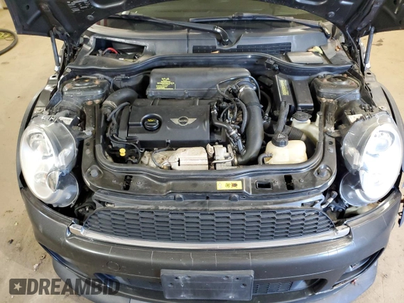 2012 MINI Coupe S z VIN WMWSX3C50CT154835, wystawiony jako Copart lot #76659984 z przebiegiem 122 425 mil mil oraz Szkoda całkowita • Salvage title. Historia ofert i sprzedaży dostępna na DreamBid. Obrazek 11.