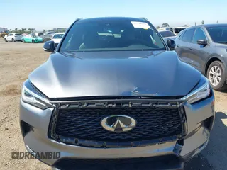 2021 Infiniti QX50 Luxe z VIN 3PCAJ5BA2MF111323, wystawiony jako IAAI lot #42218711 z przebiegiem 27 864 mil mil oraz . Historia ofert i sprzedaży dostępna na DreamBid. Obrazek 12.