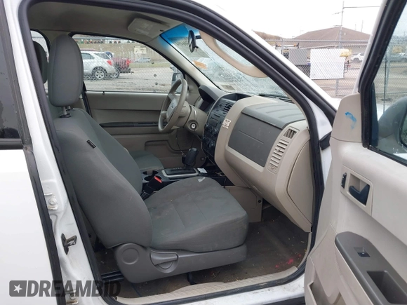 2010 Ford Escape XLS z VIN 1FMCU9C7XAKC89999, wystawiony jako IAAI lot #41506494 z przebiegiem 242 078 mil mil oraz . Historia ofert i sprzedaży dostępna na DreamBid. Obrazek 5.