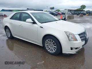 2011 Cadillac CTS Luxury with VIN 1G6DE5EY2B0122041, listed as a IAAI auction lot 42463617 with 137,547 mi miles and . Bid and sale history available at DreamBid. Image 1.