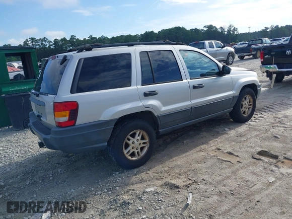2004 Jeep Grand Cherokee Laredo z VIN 1J4GW48S94C372798, wystawiony jako IAAI lot #42812536 z przebiegiem 113 960 mil mil oraz . Historia ofert i sprzedaży dostępna na DreamBid. Obrazek 4.