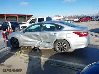 2018 Nissan Altima 2.5 SV with VIN 1N4AL3APXJC265944, listed as a IAAI auction lot 41052902 with 142,023 mi miles. Bid and sale history available at carsss.com. Image 14.
