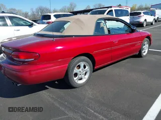 2000 Chrysler Sebring JXi with VIN 3C3EL55H2YT286901, listed as a IAAI auction lot 41868036 with 128,219 mi miles and . Bid and sale history available at DreamBid. Image 4.