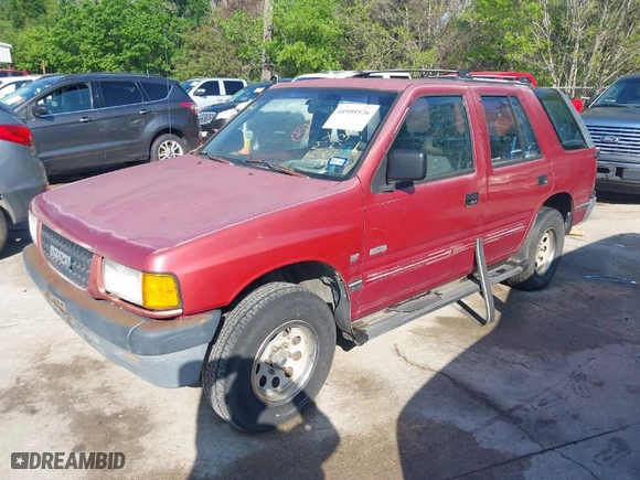 1994 Isuzu Rodeo LS with VIN 4S2CG58VXR4327327, listed as a IAAI auction lot 41959576 with 169,794 mi miles. Bid and sale history available at carsss.com. Image 2.