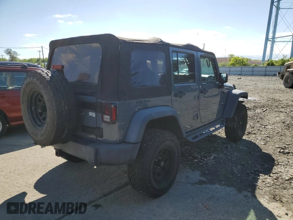 2015 Jeep Wrangler Unlimited Willys Wheeler with VIN 1C4BJWDG5FL609110, listed as a Copart auction lot 56013255 with 153,202 mi miles and Clean Title. Bid and sale history available at DreamBid. Image 3.