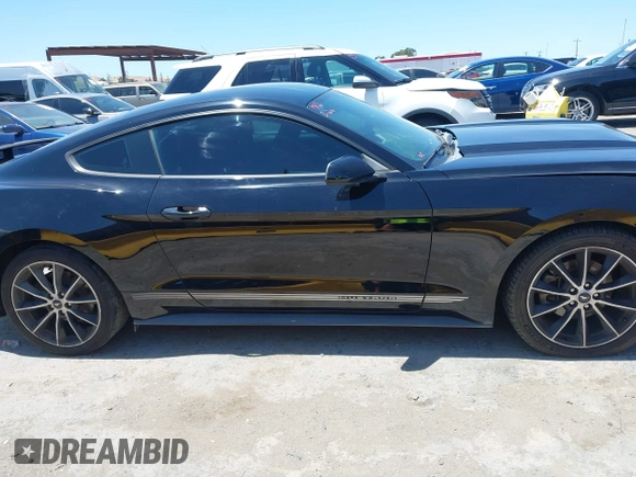 2015 Ford Mustang EcoBoost z VIN 1FA6P8TH6F5382719, wystawiony jako IAAI lot #42316250 z przebiegiem 119 412 mil mil oraz . Historia ofert i sprzedaży dostępna na DreamBid. Obrazek 13.