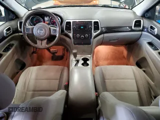 2011 Jeep Grand Cherokee Laredo with VIN 1J4RR4GG9BC521723, listed as a Copart auction lot 64126795 with 198,145 mi miles and Clean title. Bid and sale history available at DreamBid. Image 8.