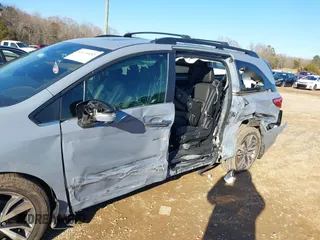 2023 Honda Odyssey Touring with VIN 5FNRL6H84PB005208, listed as a IAAI auction lot 41374452 with 60,288 mi miles and . Bid and sale history available at DreamBid. Image 6.