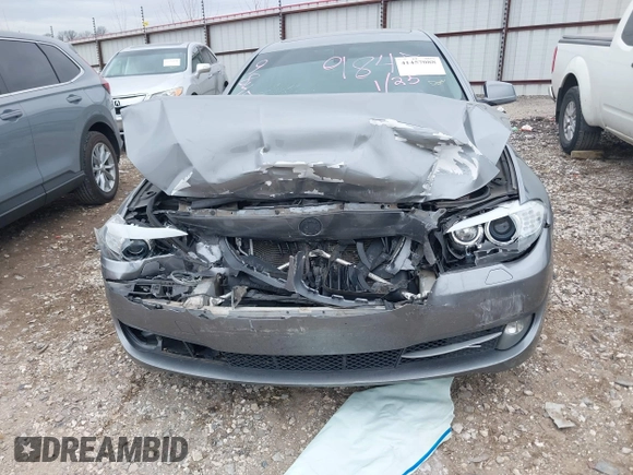 2013 BMW 5 Series 528i with VIN WBAXG5C5XDD229845, listed as a IAAI auction lot 41457088 with 130,826 mi miles and . Bid and sale history available at carsss.com. Image 6.