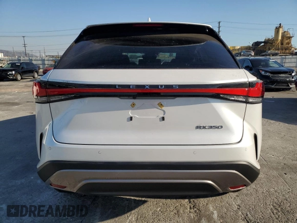2024 Lexus RX with VIN 2T2BAMBA7RC044532, listed as a Copart auction lot 77763694 with 1,130 mi miles and Salvage Title. Bid and sale history available at carsss.com. Image 6.