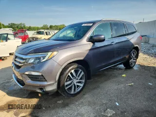 2017 Honda Pilot Touring with VIN 5FNYF6H94HB075904, listed as a Copart auction lot 62196655 with 150,255 mi miles and Salvage title. Bid and sale history available at DreamBid. Image 1.