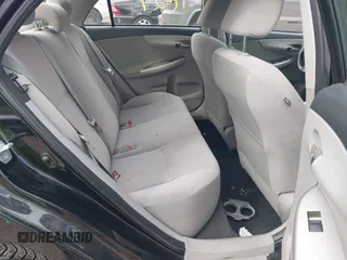 2012 Toyota Corolla L with VIN JTDBU4EE8C9180465, listed as a IAAI auction lot 41861829 with 163,631 mi miles. Bid and sale history available at carsss.com. Image 8.