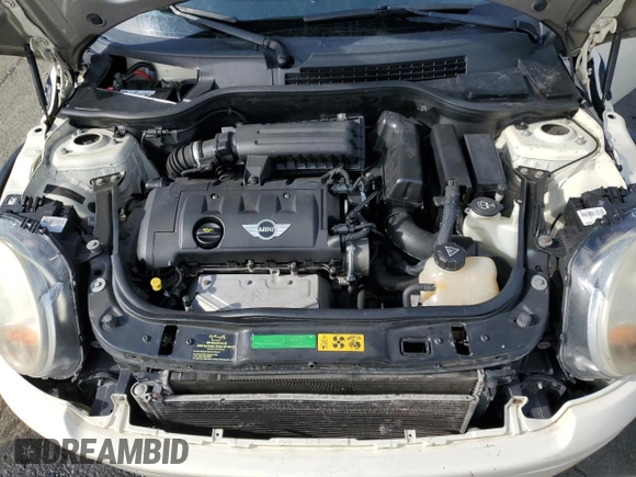 2010 MINI Hardtop with VIN WMWMF3C57ATU77370, listed as a Copart auction lot 50078605 with 187,187 mi miles and Salvage title. Bid and sale history available at DreamBid. Image 11.