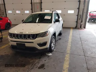 2018 Jeep Compass Sport with VIN 3C4NJCAB6JT124198, listed as a IAAI auction lot 41192196 with 104,557 mi miles. Bid and sale history available at carsss.com. Image 2.
