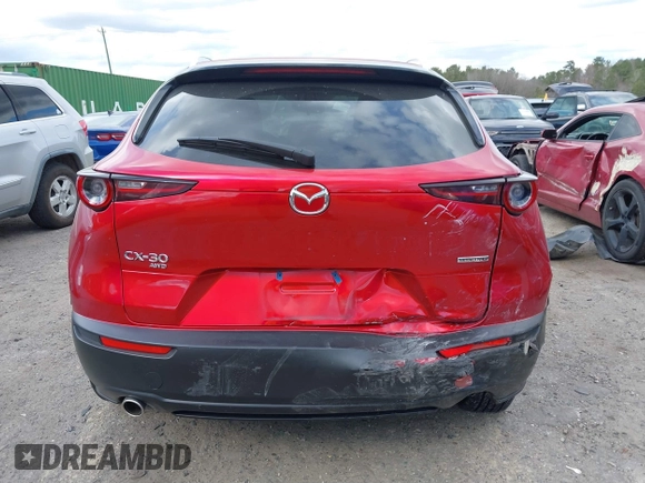 2024 Mazda CX-30 S Carbon Edition with VIN 3MVDMBCM6RM627083, listed as a IAAI auction lot 41715241 with 23,855 mi miles and . Bid and sale history available at DreamBid. Image 16.