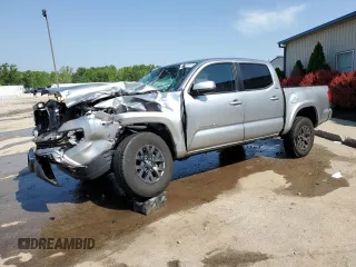 2023 Toyota Tacoma SR with VIN 3TMCZ5AN5PM626550, listed as a Copart auction lot 56658315 with 26,878 mi miles and Salvage title. Bid and sale history available at DreamBid. Image 1.