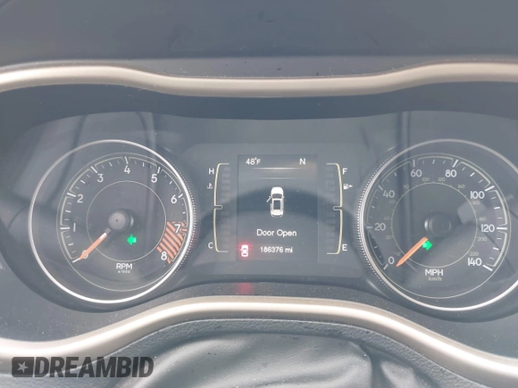 2015 Jeep Cherokee North with VIN 1C4PJMCS9FW674475, listed as a IAAI auction lot 41971771 with 186,376 mi miles. Bid and sale history available at carsss.com. Image 7.