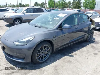 2023 Tesla Model 3 with VIN 5YJ3E1EA4PF400306, listed as a IAAI auction lot 42398603 with 18,551 mi miles and . Bid and sale history available at DreamBid. Image 20.