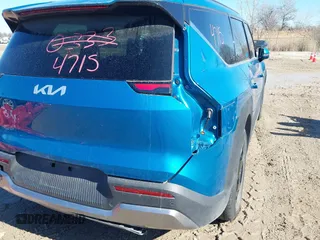 2024 Kia EV9 Wind z VIN KNDAFFS54R6024469, wystawiony jako IAAI lot #41674715 z przebiegiem 19 387 mil mil oraz . Historia ofert i sprzedaży dostępna na DreamBid. Obrazek 21.