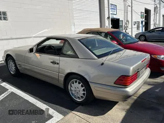 1998 Mercedes-Benz SL-Class with VIN WDBFA67F4WF157541, listed as a Copart auction lot 82624554 with 102,469 mi miles and Clean Title. Bid and sale history available at carsss.com. Image 3.