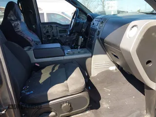 2004 Ford F-150 XLT with VIN 1FTPW14504KA75025, listed as a IAAI auction lot 41794581 with 213,022 mi miles. Bid and sale history available at carsss.com. Image 5.