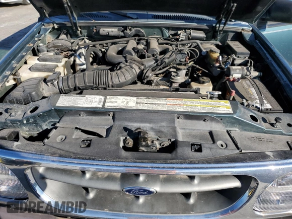 1997 Ford Explorer XL with VIN 1FMDU34E2VZC03015, listed as a Copart auction lot 80654764 with 295,587 mi miles and Salvage title. Bid and sale history available at DreamBid. Image 11.