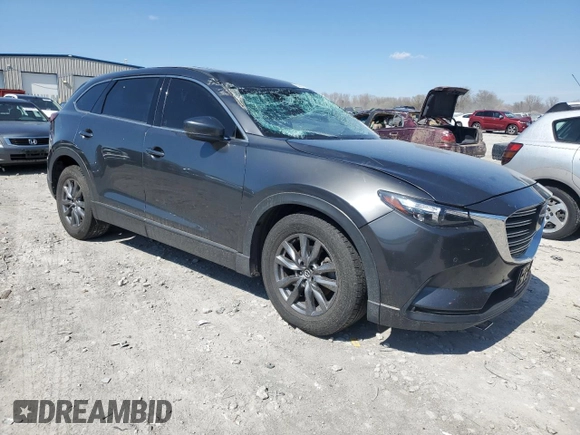 2021 Mazda CX-9 Touring z VIN JM3TCACY5M0500924, wystawiony jako Copart lot #50654505 z przebiegiem 57 067 mil mil oraz Szkoda całkowita • Salvage title. Historia ofert i sprzedaży dostępna na DreamBid. Obrazek 4.