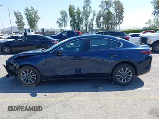 2024 Mazda 3 S with VIN 3MZBPAAMXRM421243, listed as a IAAI auction lot 41997588 with 10,099 mi miles and . Bid and sale history available at DreamBid. Image 14.