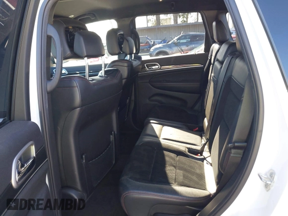 2017 Jeep Grand Cherokee Trailhawk with VIN 1C4RJFLGXHC959092, listed as a IAAI auction lot 41232281 with 108,659 mi miles and . Bid and sale history available at DreamBid. Image 8.