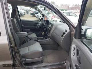 2005 Ford Escape XLS Value with VIN 1FMYU92Z35KA20497, listed as a IAAI auction lot 41509893 with 149,866 mi miles. Bid and sale history available at carsss.com. Image 5.