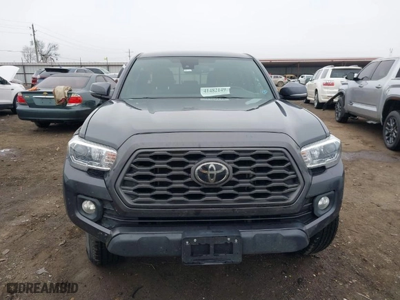 2022 Toyota Tacoma 4WD SR with VIN 3TMCZ5AN4NM476170, listed as a IAAI auction lot 41482149 with 57,126 mi miles. Bid and sale history available at carsss.com. Image 12.