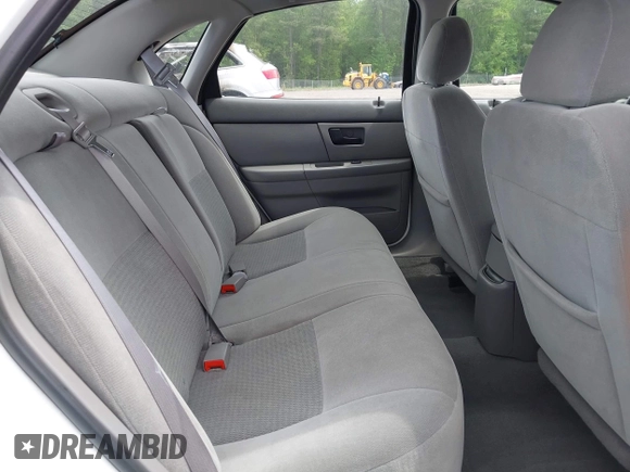 2007 Ford Taurus SE z VIN 1FAFP53U57A101188, wystawiony jako IAAI lot #42102585 z przebiegiem Nie podano mil oraz . Historia ofert i sprzedaży dostępna na DreamBid. Obrazek 8.