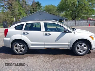 2007 Dodge Caliber SXT with VIN 1B3HB48BX7D160420, listed as a IAAI auction lot 42133771 with 169,796 mi miles and . Bid and sale history available at carsss.com. Image 14.