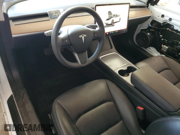 2023 Tesla Model 3 z VIN 5YJ3E1EA4PF475734, wystawiony jako Copart lot #46301445 z przebiegiem 20 643 mil mil oraz Szkoda całkowita • Salvage title. Historia ofert i sprzedaży dostępna na DreamBid. Obrazek 8.