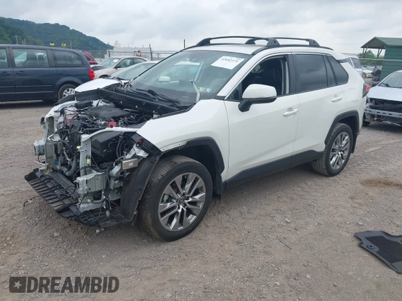 2022 Toyota RAV4 XLE Premium z VIN 2T3A1RFV4NW287421, wystawiony jako IAAI lot #42602371 z przebiegiem 59 294 mil mil oraz . Historia ofert i sprzedaży dostępna na DreamBid. Obrazek 17.