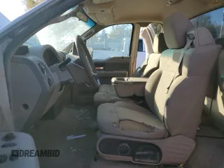 2007 Ford F-150 XL with VIN 1FTRF14V47KC19429, listed as a Copart auction lot 80147594 with 101,749 mi miles and Salvage title. Bid and sale history available at DreamBid. Image 7.