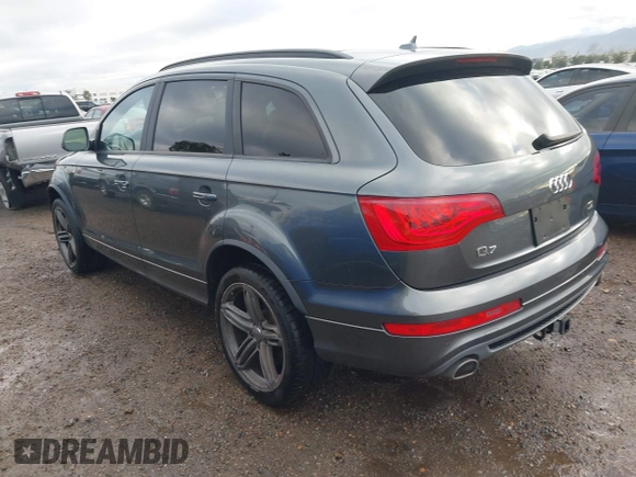 2014 Audi Q7 3.0L TDI Prestige with VIN WA1WMAFE0ED018516, listed as a IAAI auction lot 41749208 with 129,498 mi miles. Bid and sale history available at carsss.com. Image 3.