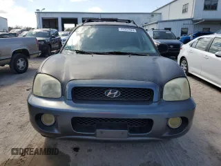 2002 Hyundai Santa Fe GLS with VIN KM8SC13D72U190570, listed as a Copart auction lot 77257524 with 244,808 mi miles and Salvage Title. Bid and sale history available at carsss.com. Image 5.
