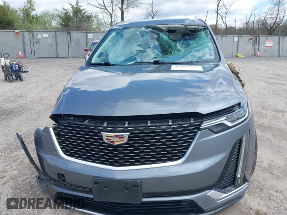 2020 Cadillac XT6 FWD Premium Luxury z VIN 1GYKPCRS9LZ129763, wystawiony jako IAAI lot #42052532 z przebiegiem 57 670 mil mil oraz . Historia ofert i sprzedaży dostępna na DreamBid. Obrazek 11.
