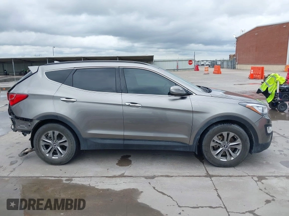 2014 Hyundai Santa Fe with VIN 5XYZU3LB2EG155127, listed as a IAAI auction lot 41864518 with Not provided miles and . Bid and sale history available at DreamBid. Image 14.