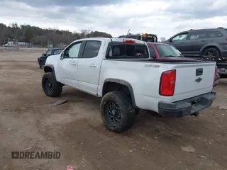 2018 Chevrolet Colorado 4WD ZR2 with VIN 1GCGTEEN3J1295176, listed as a IAAI auction lot 41418943 with 57,621 mi miles. Bid and sale history available at carsss.com. Image 3.